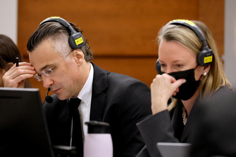 Assistant Public Defender Melisa McNeill and capital defense attorney Casey Secor participate in a sidebar discussion via headsets during the penalty phase of the trial of Marjory Stoneman Douglas High School shooter Nikolas Cruz at the Broward County Courthouse in Fort Lauderdale on Monday, August 1, 2022. Cruz previously plead guilty to all 17 counts of premeditated murder and 17 counts of attempted murder in the 2018 shootings.