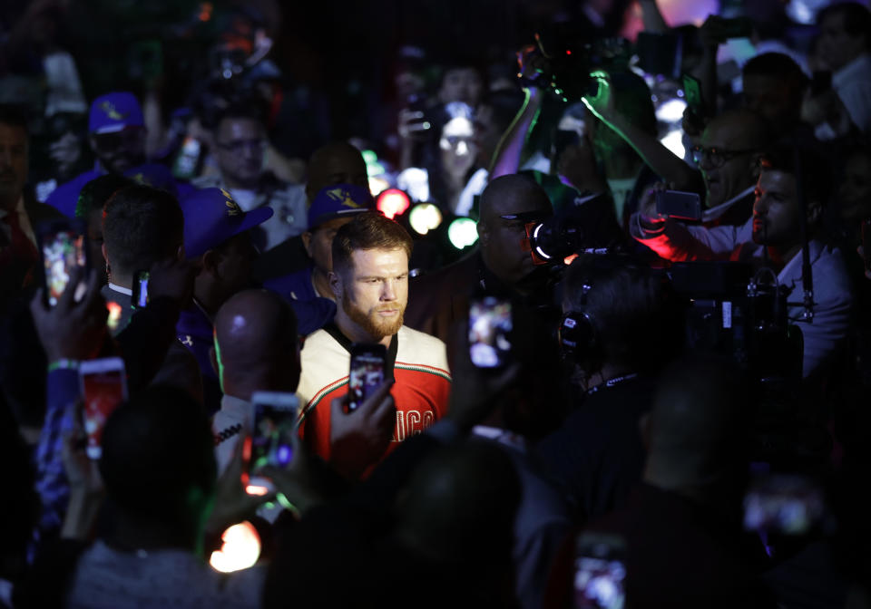 Canelo Alvarez is blaming eating contaminated meat for his failed drug tests in February. (AP Photo/John Locher)