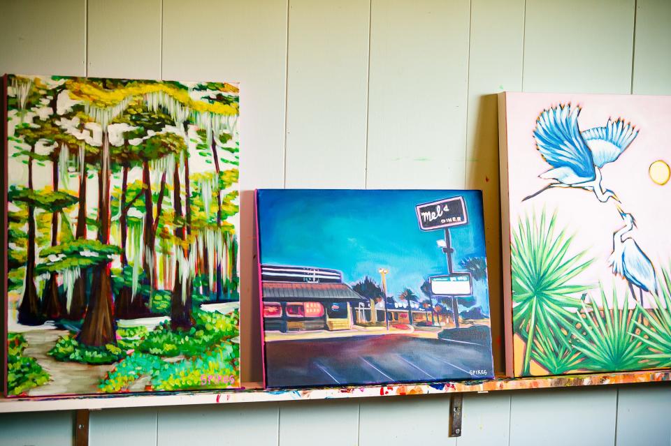 Emily Spikes is a local artist who puts a unique and colorful twist on her Louisiana-themed paintings from her home studio in Lafayette. Thursday, July 7, 2022.