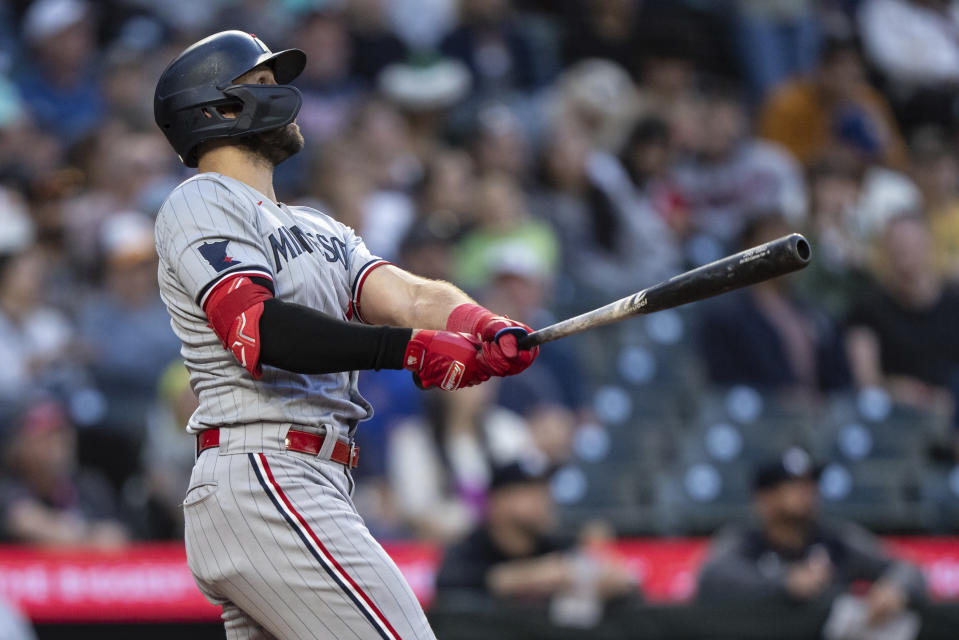 Minnesota Twins' Joey Gallo hits a solo home run off Seattle Mariners relief pitcher Gabe Speier during the sixth inning of a baseball game, Monday, July 17, 2023, in Seattle. (AP Photo/Stephen Brashear)