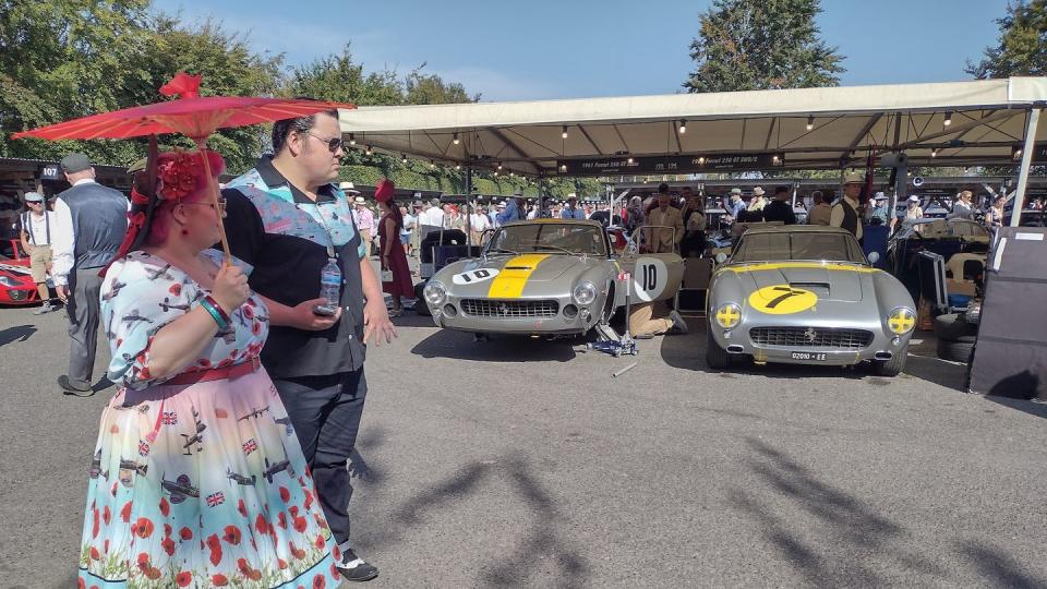 ferraris and admirers at goodwood