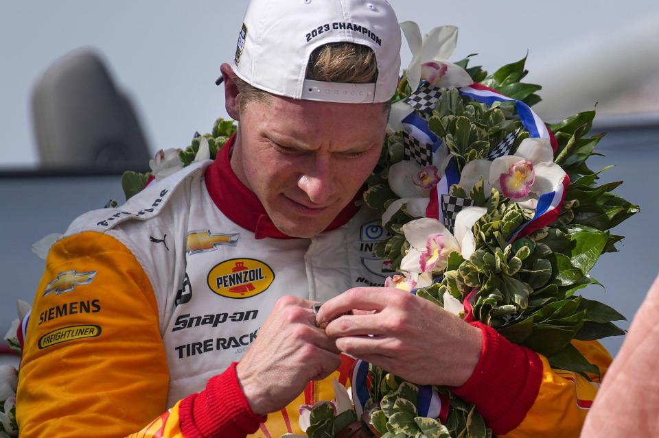 Team Penske driver Josef Newgarden (2) notices that his winning ring fell apart on Sunday, May 28, 2023, after he won the 107th running of the Indianapolis 500 at Indianapolis Motor Speedway. 