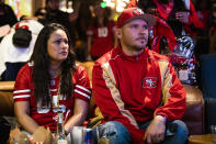 Priscilla Ostergar (L) and her husband Paul Ostergar of West Sacramento, California react during a Super Bowl LIV watch party after the Kansas City Chiefs defeat the San Francisco 49ers, at SPIN San Francisco on February 2, 2020 in San Francisco, California. The San Francisco 49ers faced the Kansas City Chiefs in Super Bowl LIV for their seventh appearance at the NFL championship, leading the game into half time and losing after 21 unanswered points in the second half of the game. (Photo by Philip Pacheco/Getty Images)