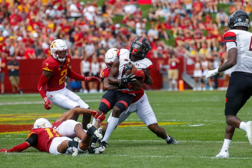 Southeast Missouri State wide receiver Damoriea Vick (16) is brought down by Iowa State linebacker O’Rien Vance (34) during the Iowa State, Southeast Missouri State game on Saturday