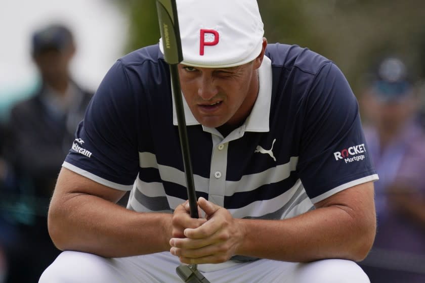 Bryson DeChambeau lines up his putt on the first green during the final round of the U.S. Open Golf Championship.