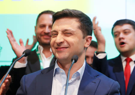 Ukrainian presidential candidate Volodymyr Zelenskiy reacts following the announcement of the first exit poll in a presidential election at his campaign headquarters in Kiev, Ukraine April 21, 2019. REUTERS/Valentyn Ogirenko