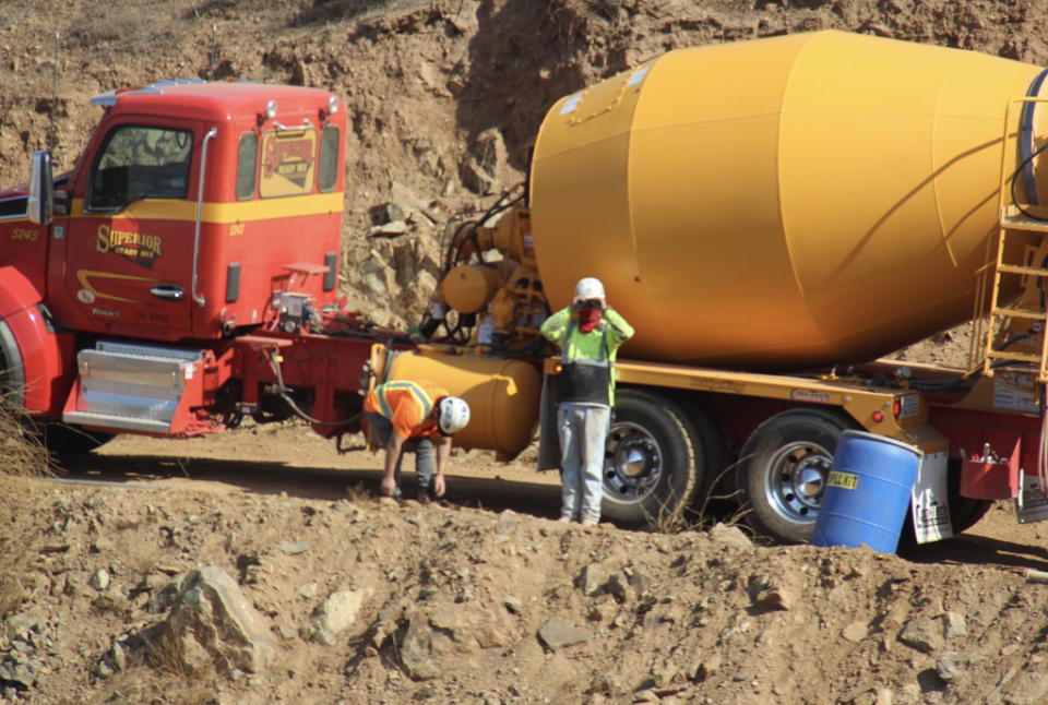 Construction workers returning to the US-Mexico border wall area on the outskirts of Tijuana in September 2021 (Daniel Watman)