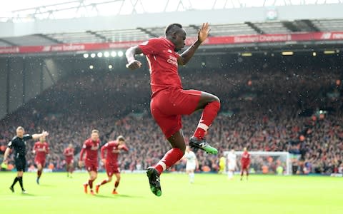 Sadio Mane of Liverpool celebrates scoring his sides second goal during the Premier League match between Liverpool FC and Burnley FC at Anfield on March 10, 2019 in Liverpool, United Kingdom - Credit: Getty Images