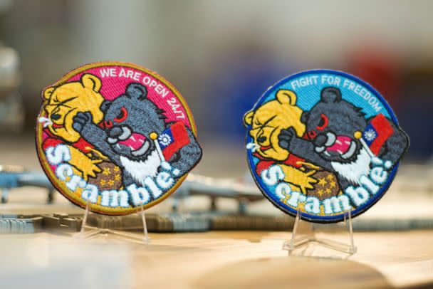 PHOTO: This picture shows patches depicting a Formosan black bear holding a Taiwanese flag punching Winnie-the-Pooh at a shop in Taoyuan, Taiwan, on April 11, 2023. (Sam Yeh/AFP via Getty Images)