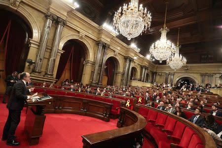 Catalan regional deputy Jordi Turull speaks during his investiture session as new Catalan President at regional parliament in Barcelona, Spain, March 22, 2018. REUTERS/Albert Gea