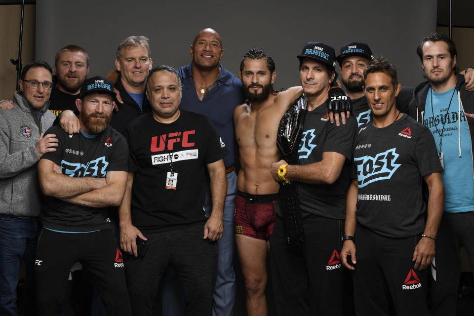 Former featherweight world champion turned coach Mike Brown (third from the left) has established himself as one of the best teachers in all of MMA (Getty Images).