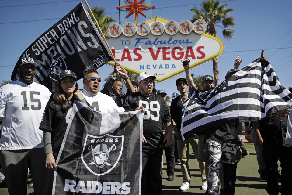 FILE - Fans cheer before the Oakland Raiders made their fourth-round pick, during an NFL football draft event April 29, 2017, in Las Vegas. The Vegas Golden Knights' Stanley Cup championship is the latest big step for a city that didn't have major professional sports less than a decade ago. (AP Photo/John Locher, File)