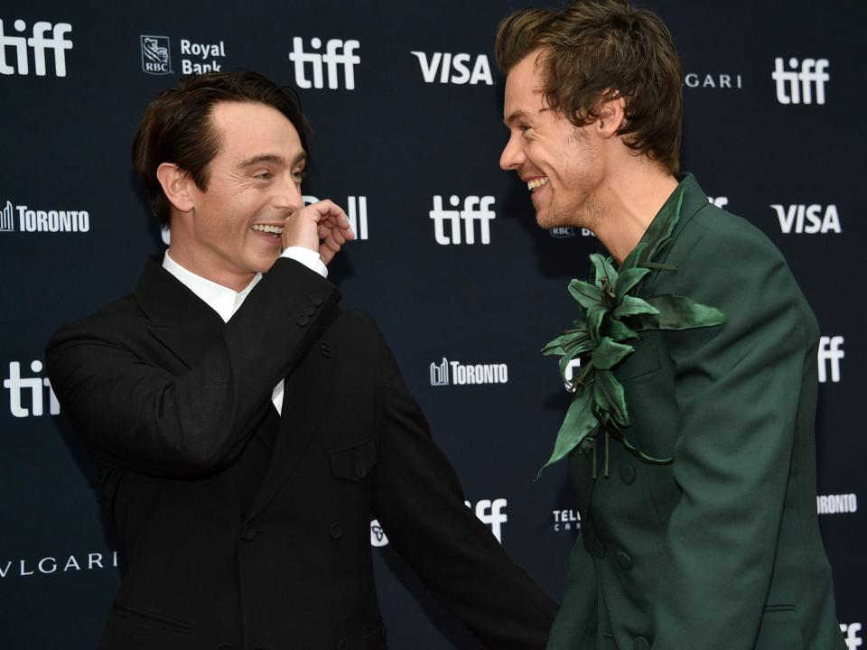 David Dawson, left, and Harry Styles attend the premiere of "My Policeman" at the Princess of Wales Theatre during the Toronto International Film Festival, Sunday, Sept. 11, 2022, in Toronto.