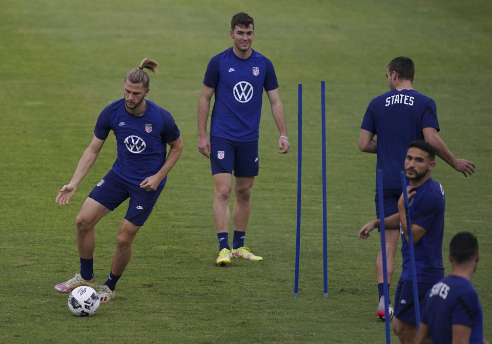 United States' Walker Zimmerman, left, controls a ball during a training session ahead of the World Cup 2022 qualifying soccer match against Jamaica in Kingston, Monday, Nov. 15, 2021.(AP Photo/Fernando Llano)