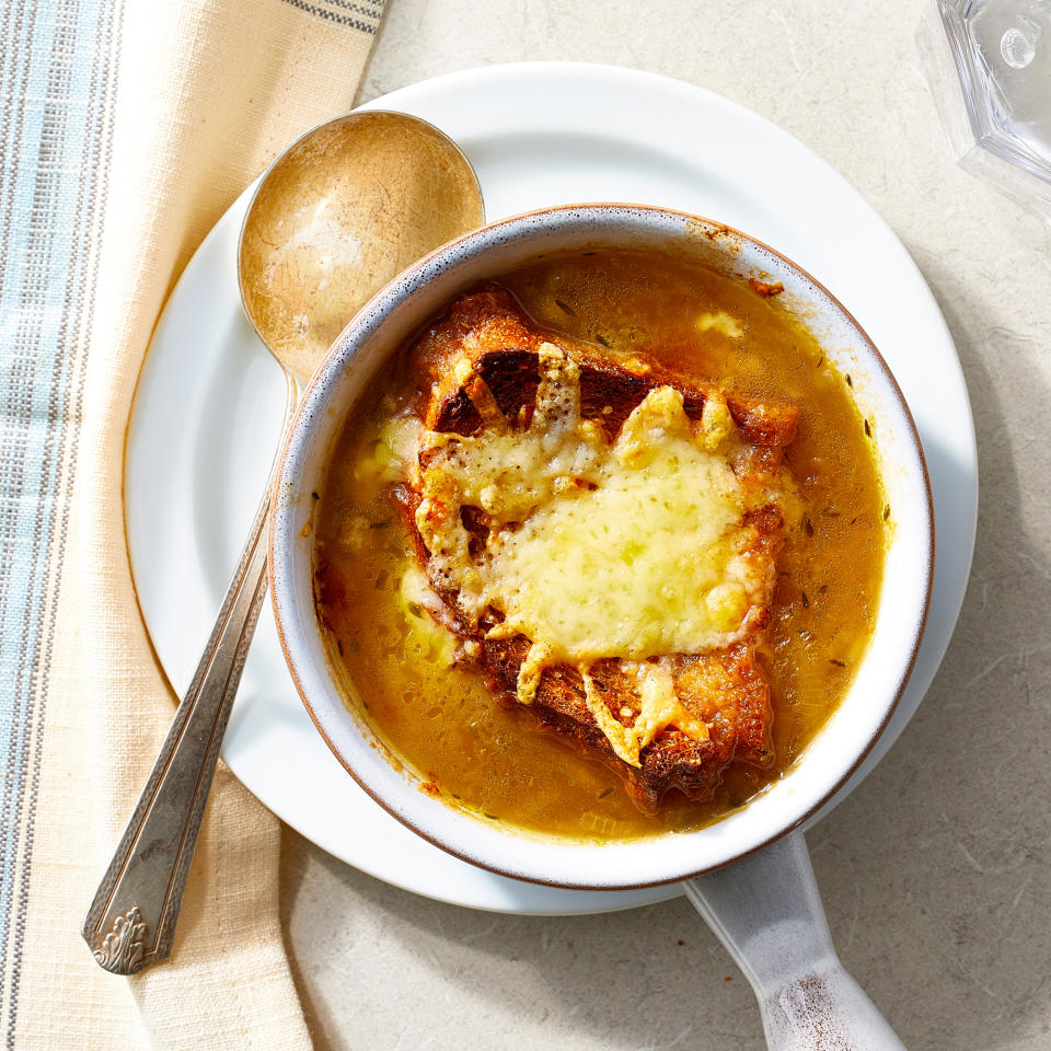 <p>This vegetarian French onion soup is teeming with onions and shallots that caramelize and add sweet and savory flavor to the soup. Vegetable broth stands in for beef broth, but mushroom broth, with its dark color and earthy flavor, is also a good option.</p> <p> <a href="https://www.eatingwell.com/recipe/8019196/vegetarian-french-onion-soup/" rel="nofollow noopener" target="_blank" data-ylk="slk:View Recipe" class="link ">View Recipe</a></p>