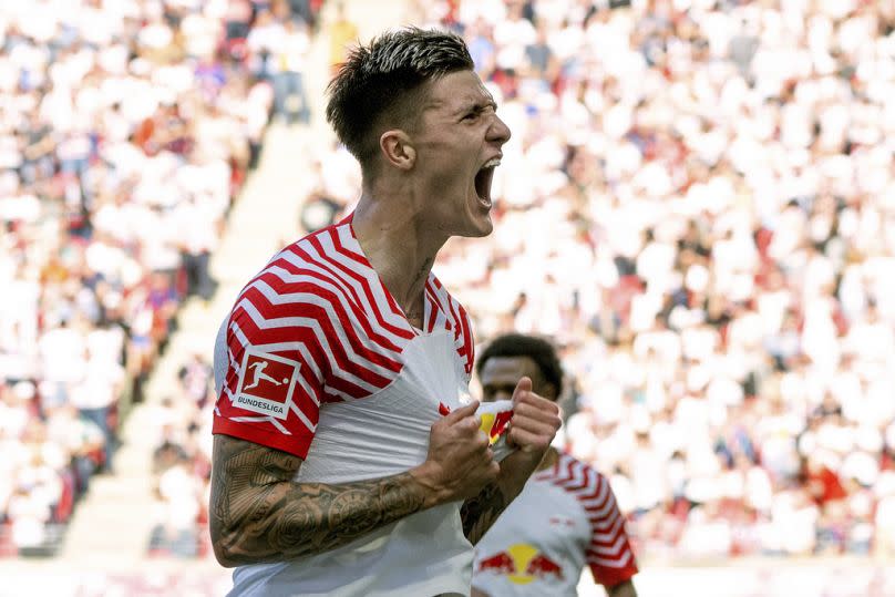 Benjamin Šeško celebrates scoring for RB Leipzig against Werder Bremen in Leipzig on May 11, 2024