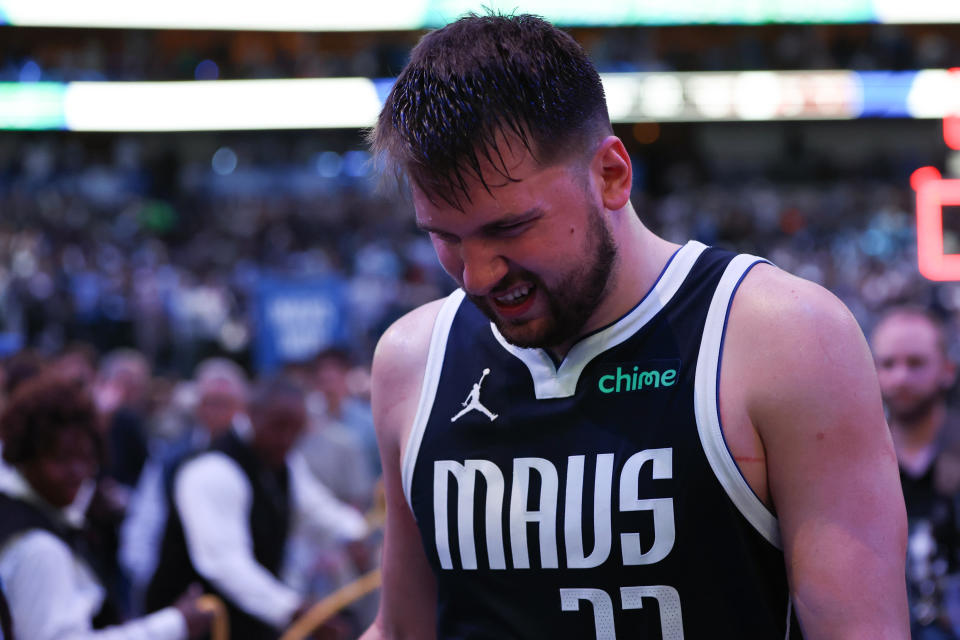 Dallas Mavericks' Luka Doncic is enduring some very physical defense against the Thunder in this series while nursing a sore right knee. (Photo by Tim Heitman/Getty Images)