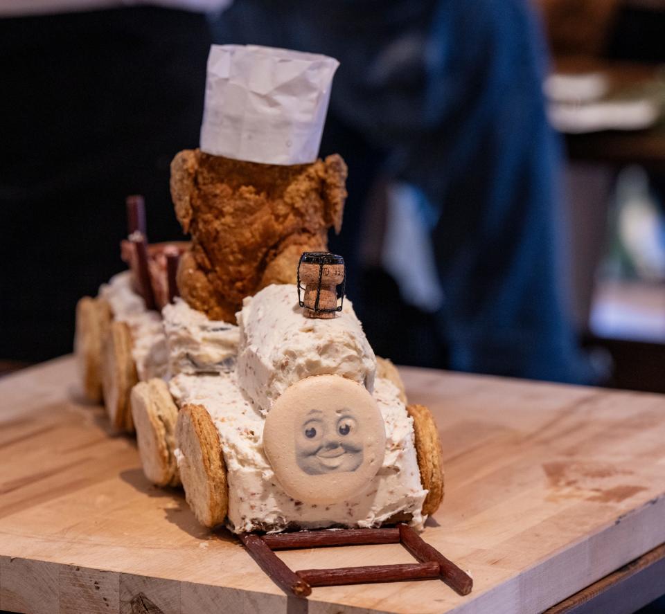 A train-inspired meat cake creation on display during the annual Meat Cake Invitational, Sunday, Feb. 25, 2024, at Half Liter Beer & BBQ Hall, in Indianapolis.