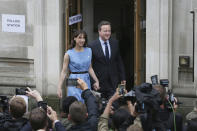 FILE - In this Thursday, June 23, 2016 file photo, Britain's Prime Minister David Cameron and his wife Samantha leave after casting their votes in the EU referendum at a polling station in London. Five years ago, Britons voted in a referendum that was meant to bring certainty to the U.K.’s fraught relationship with its European neigbors. Voters’ decision on June 23, 2016 was narrow but clear: By 52 percent to 48 percent, they chose to leave the European Union. It took over four years to actually make the break. The former partners are still bickering, like many divorced couples, over money and trust. (AP Photo/Tim Ireland, File)