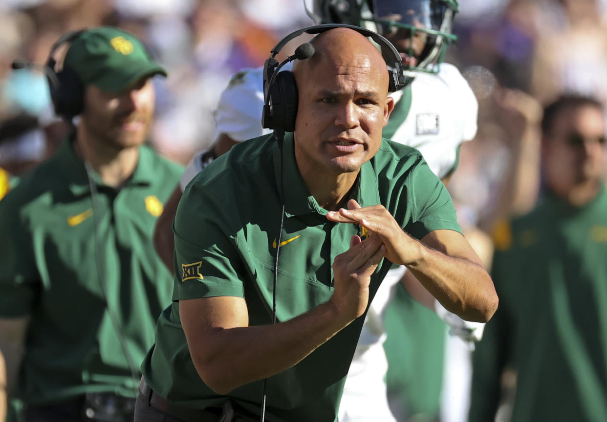 Nov 6, 2021; Fort Worth, Texas, USA;  Baylor Bears head coach Dave Aranda calls a timeout during the second quarter against the TCU Horned Frogs at Amon G. Carter Stadium. Mandatory Credit: Kevin Jairaj-USA TODAY Sports