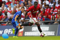 Football Soccer Britain - Leicester City v Manchester United - FA Community Shield - Wembley Stadium - 7/8/16 Manchester United's Eric Bailly in action with Leicester City's Jamie Vardy Reuters / Eddie Keogh Livepic EDITORIAL USE ONLY. No use with unauthorized audio, video, data, fixture lists, club/league logos or "live" services. Online in-match use limited to 45 images, no video emulation. No use in betting, games or single club/league/player publications. Please contact your account representative for further details.