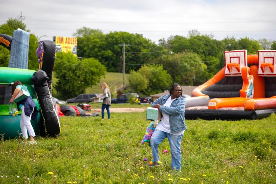 Long-time volunteer Michelle Allen hides eggs ahead of the annual Easter egg hunt at the Como Community Center in Fort Worth on Saturday, April 8, 2023. Allen worked for the Como Community Center for decades before retiring and continuing to volunteer.