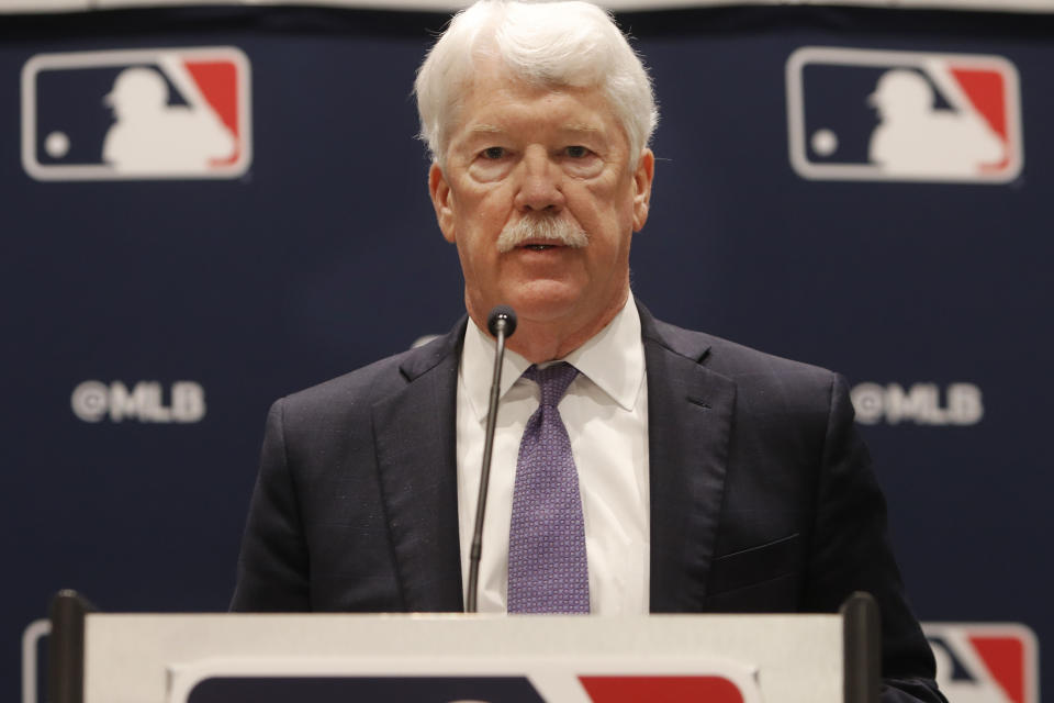 New Kansas City Royals owner John Sherman makes a brief statement to reporters after a baseball owners meeting in Arlington, Texas, Thursday, Nov. 21, 2019. (AP Photo/LM Otero)