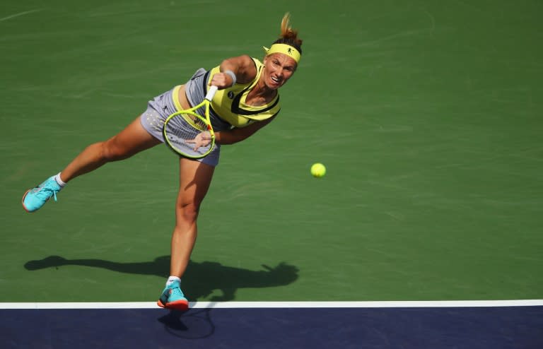 Svetlana Kuznetsova of Russia serves against Anastasia Pavlyuchenkova of Russia in the quarter final match during day ten of the BNP Paribas Open at Indian Wells Tennis Garden on March 15, 2017