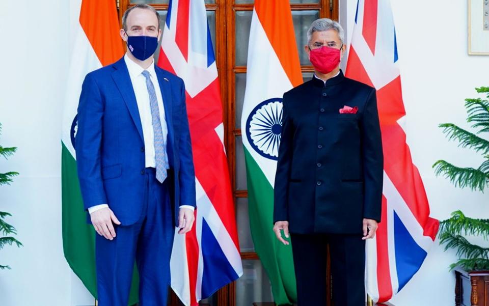 DELHI, INDIA - DECEMBER 15: (----EDITORIAL USE ONLY - MANDATORY CREDIT - "INDIAN GOVERNMENT / HANDOUT" - NO MARKETING NO ADVERTISING CAMPAIGNS - DISTRIBUTED AS A SERVICE TO CLIENTS----) India's Foreign Minister Subrahmanyam Jaishankar (R) and British Foreign Secretary Dominic Raab (L) pose for a photo during their meeting, in New Delhi, India, December 15,2020.  - Indian Government via Getty Images