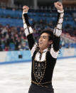 Michael Christian Martinez of the Philippines gestures as he leaves the ice after the men's short program figure skating competition at the Iceberg Skating Palace during the 2014 Winter Olympics, Thursday, Feb. 13, 2014, in Sochi, Russia. (AP Photo/Ivan Sekretarev)