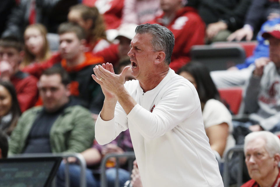 Washington State coach Kyle Smith encourages the team during the first half of an NCAA college basketball game against California, Thursday, Feb. 15, 2024, in Pullman, Wash. (AP Photo/Young Kwak)