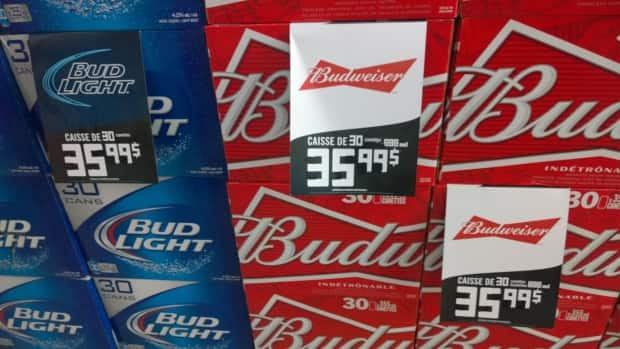 Beer in Quebec can be 50 cents cheaper per can than in New Brunswick. It's enough for hundreds of locals to justify regular trips across the border. (Shane Fowler/CBC - image credit)