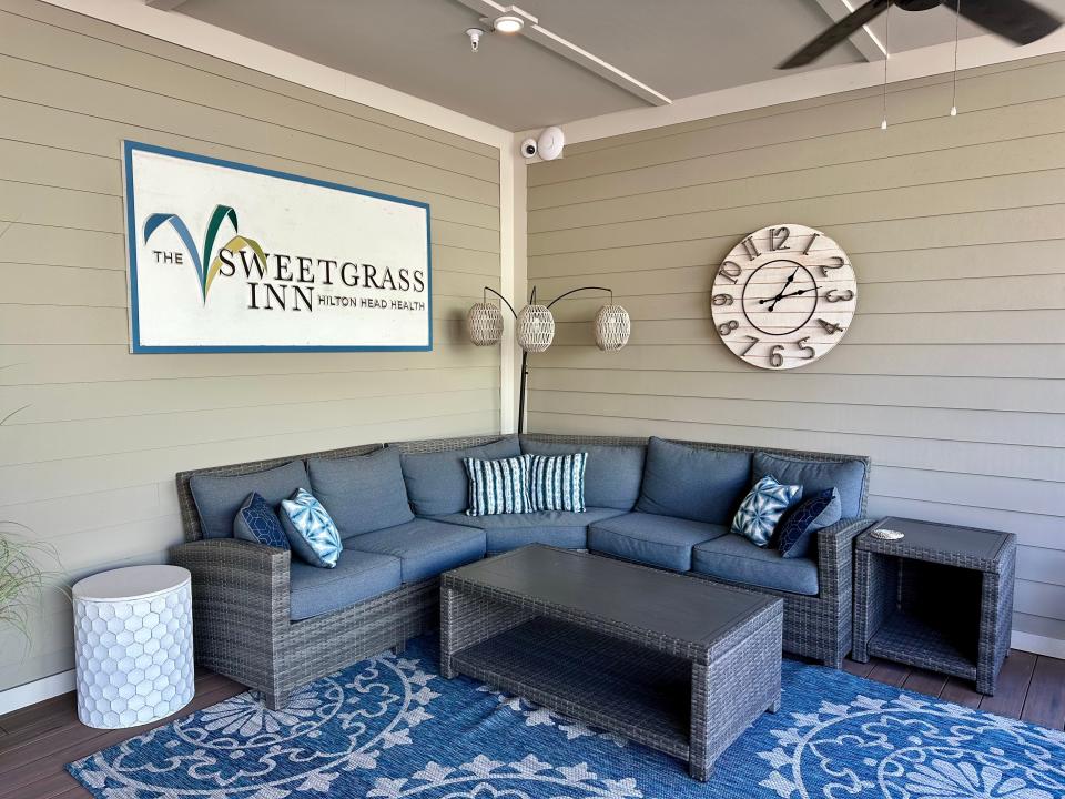 Sweetgrass inn at hilton head health sectional couch and sign outdoors