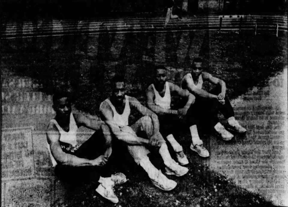 The Howard 1984 1,600-meter relay team takes a break. (From left to right): Adrian Murphy, Steve Brown, Yusuf Nuriddin and Tony Brown. Theron Palmer ran on Howard's 1984 Penn Relays 4x400 relay after Brown reaggravated an injury running the 4x100. The team ran the state record in the qualifying heats.