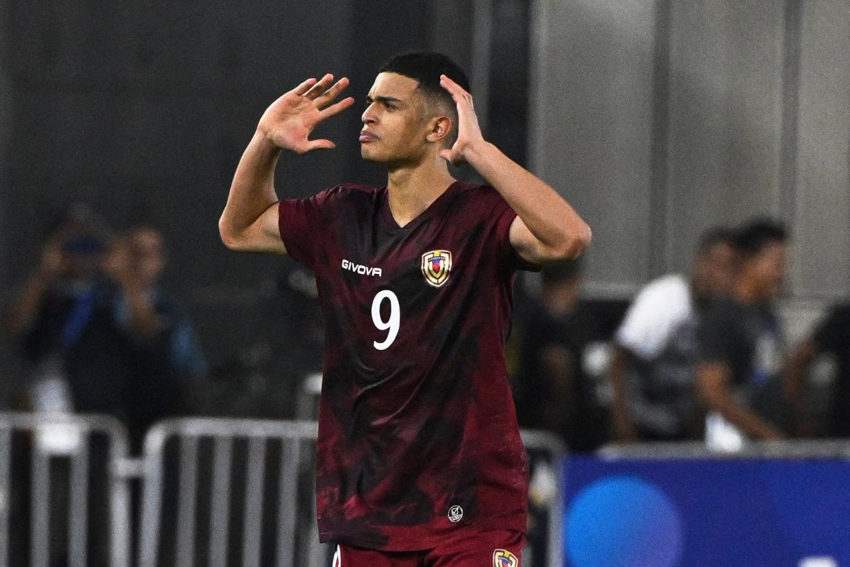 Venezuela's Kevin Kelsy celebrates after scoring during the Venezuela 2024 CONMEBOL Pre-Olympic Tournament football match between Argentina and Venezuela at the Brigido Iriarte stadium in Caracas on February 5, 2024. (Photo by Federico Parra / AFP) (Photo by FEDERICO PARRA/AFP via Getty Images)