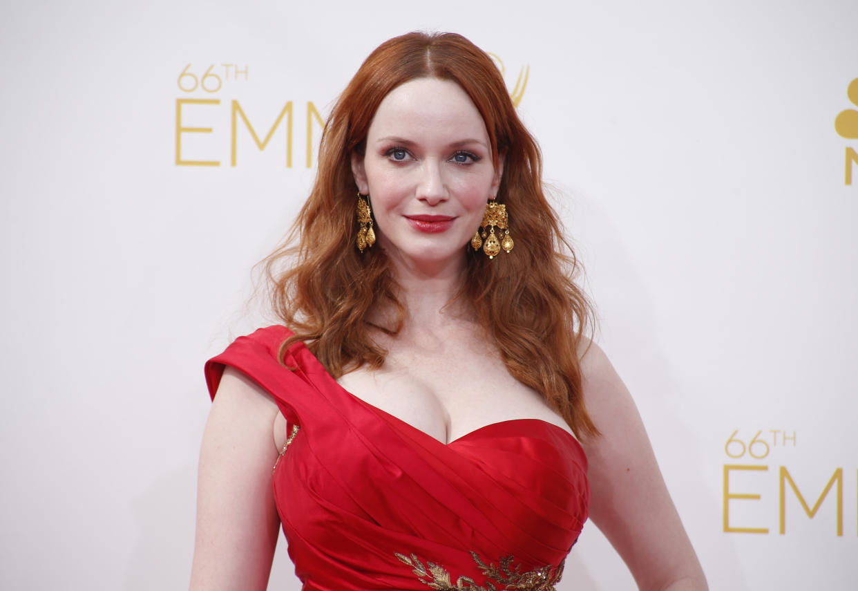 Christina Hendricks, here at the 2014 Emmy Awards, opens up about sexual harassment, Mad Men and more. 