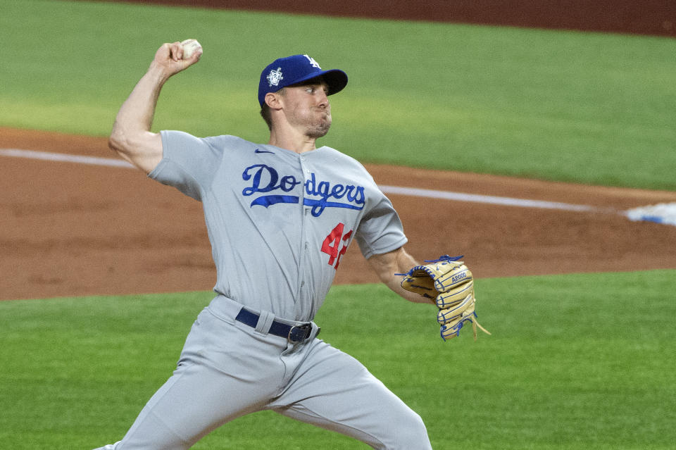 Los Angeles Dodgers starting pitcher Ross Stripling works against the Texas Rangers during the first inning of a baseball game Saturday, Aug. 29, 2020, in Arlington, Texas. (AP Photo/Jeffrey McWhorter)