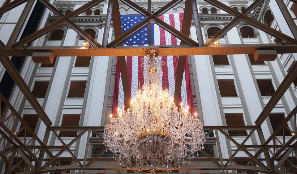 WASHINGTON, DC - FEBRUARY 03:  The American flag hangs in the Trump International Hotel on February 03, 2020 in Washington, DC.