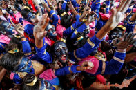 <p>Students dance as they participate in celebrations ahead of the Janmashtami festival, which marks the birth anniversary of Lord Krishna in Mumbai, India, Aug. 23, 2016. (Danish Siddiqui/Reuters) </p>