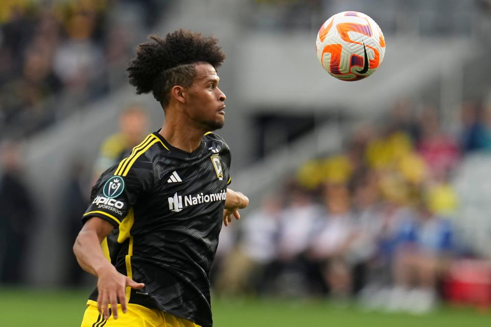 Mar 12, 2024; Columbus, OH, USA; Columbus Crew forward Jacen Russell-Rowe (19) eyes the incoming ball during the first half of the Concacaf Champions Cup soccer game against the Houston Dynamo at Lower.com Field. Mandatory Credit: Adam Cairns-USA TODAY Sports