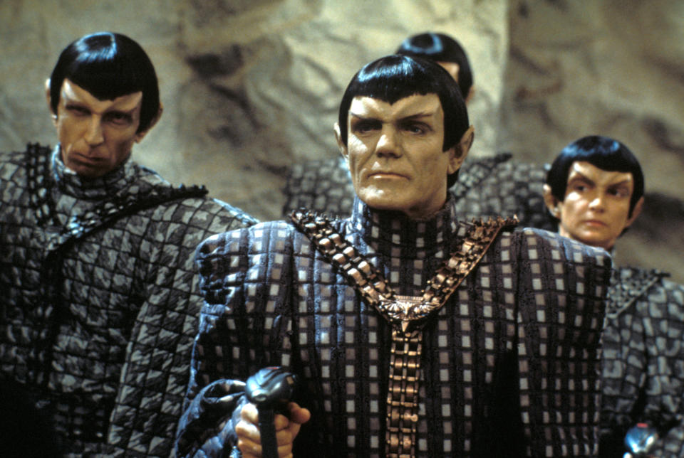 British actor Maurice Roeves (as a Romulan Captain) (fore) and several unidentified others in a scene from an episode of the television series 'Star Trek: The Next Generation' entitled 'The Chase,' California, April 26, 1993. (Photo by CBS Photo Archive/Getty Images)