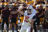 Arizona quarterback Will Plummer throws against Arizona State in the first half during an NCAA college football game, Saturday, Nov. 27, 2021, in Tempe, Ariz. (AP Photo/Rick Scuteri)