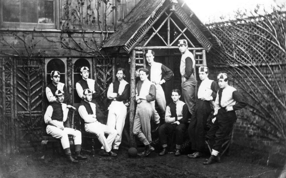 The 1865 Eton field XI pose in the college grounds - Hulton Archive