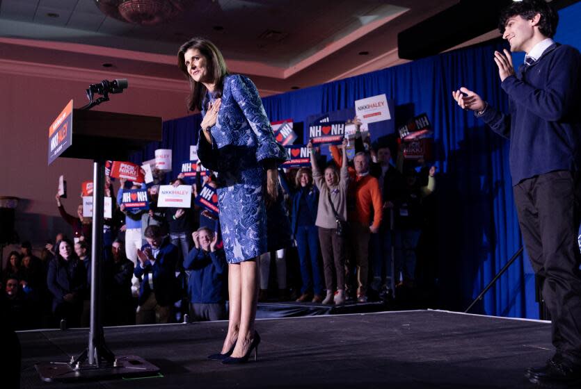 CONCORD, NEW HAMPSHIRE- JANUARY 23, 2024: Republican candidate for president Nikki Haley bows to her supporters after losing the New Hampshire Primary to Donald Trump at the Grappone Conference Center on January 23, 2024 in Concord, New Hampshire. She said she's not giving up and will be moving on to South Carolina. (Gina Ferazzi / Los Angeles Times)