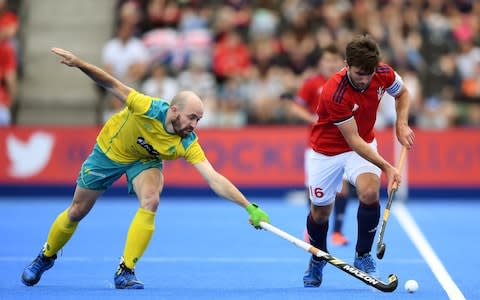 Matthew Swann (l) of Australia attempts to tackle Adam Dixon (r) of Great Britain during the Men's FIH Field Hockey Pro League match between Great Britain and Australia at Lee Valley Hockey and Tennis Centre on June 09, 2019 in London, United Kingdom - Credit: Getty Images