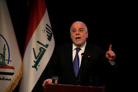 FILE PHOTO: Iraq's Prime Minister Haider al-Abadi speaks during a ceremony in Najaf, Iraq January 7, 2018. REUTERS/Alaa Al-Marjani/File Photo
