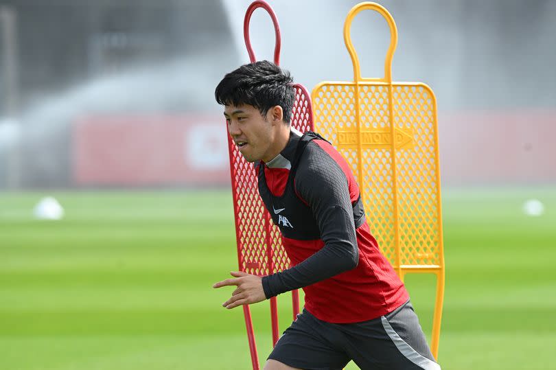 Wataru Endo of Liverpool during a training session at AXA Training Centre on May 02, 2024 in Kirkby, England.