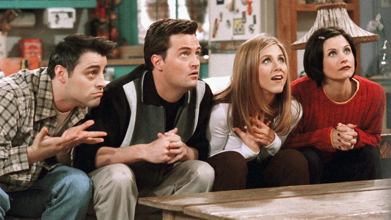 Matthew LeBlanc, Matthew Perry, Jennifer Aniston and Courteney Cox in character on "Friends," all anxiously looking up at something