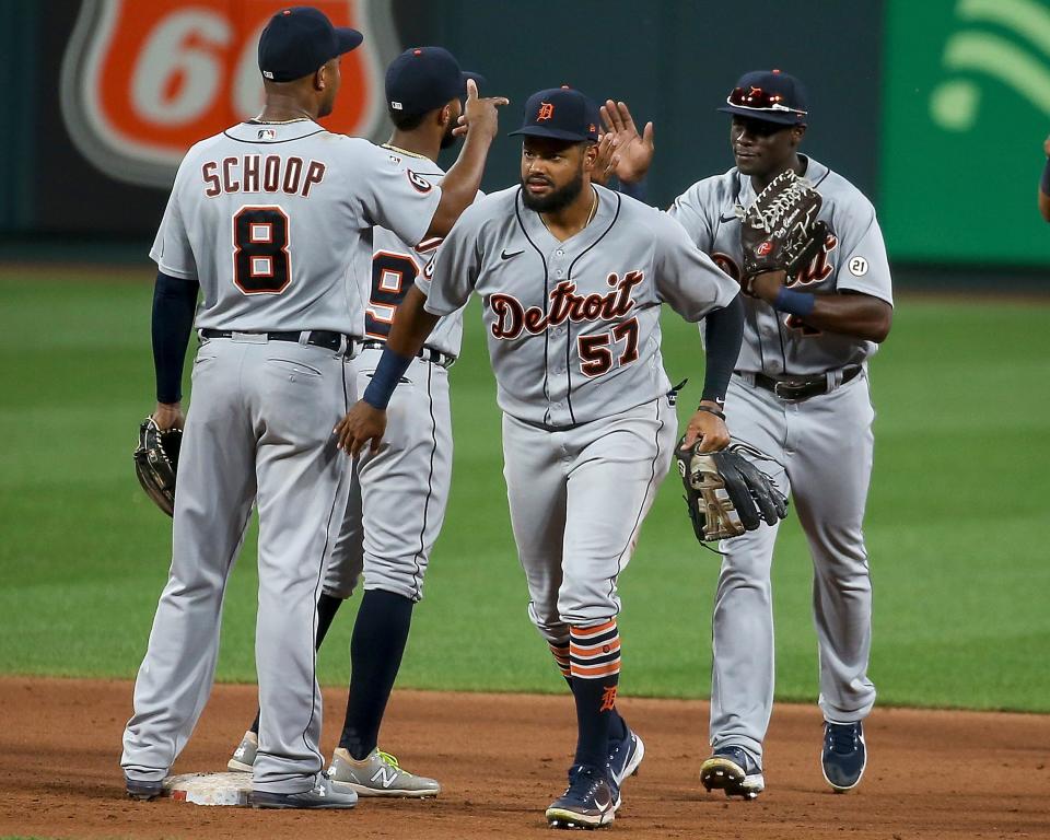 Tigers left fielder Jorge Bonifacio (57) celebrates with teammates after the Tigers' 6-3 win in the second game of the doubleheader on Thursday, Sept. 10, 2020, in St. Louis.