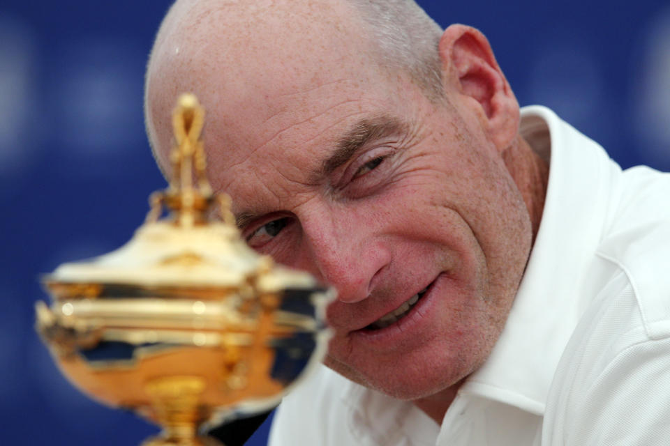 USA Captain Jim Furyk looks at his European counterpart Thomas Bjorn during a news conference ahead of the Ryder Cup at the Golf National in Guyancourt, outside Paris, France, Monday, Sept. 24, 2018. The 42nd Ryder Cup Matches will be held in France from Sept. 28-30, 2018, at the Albatros Course of Le Golf National. (AP Photo/Francois Mori)